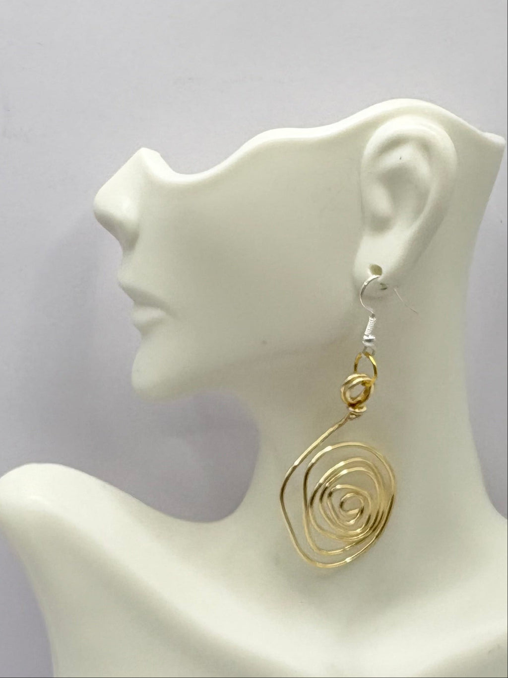Gold spiral earring